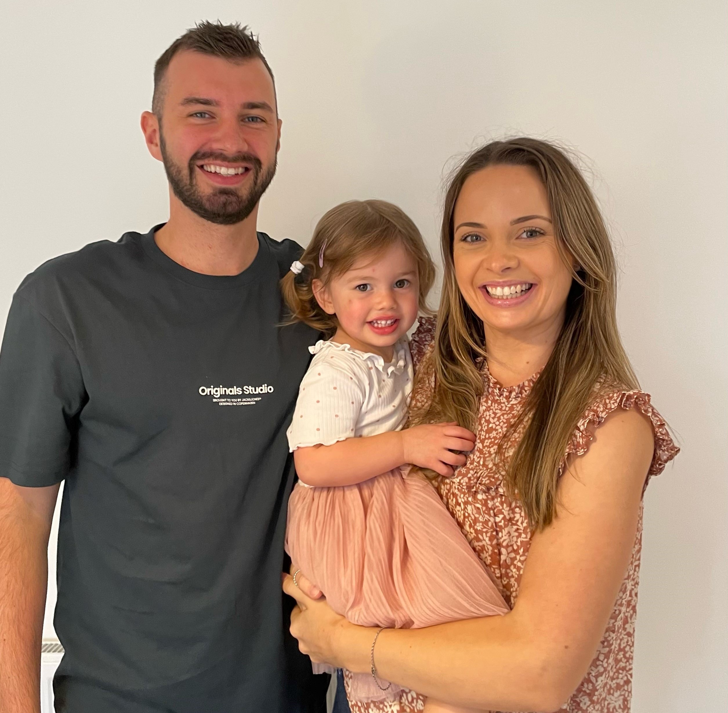 Megan Hughes, her fiance James Parmar and their daughter Grace